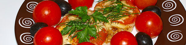 Рыба запеченная с помидорами и сыром